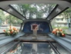 Carroza Funebre Joshua SMA Interior con techo en cristal y plataforma especial para las cenizas funeraria Betancur